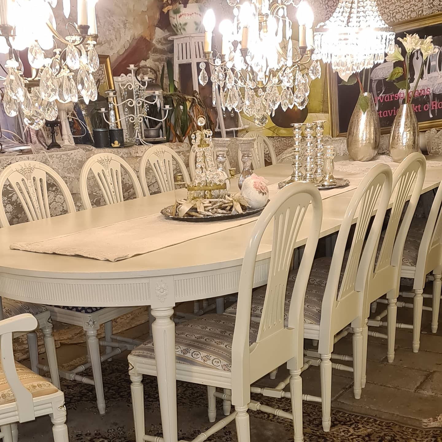 a pile of rugs sitting on the side of a building